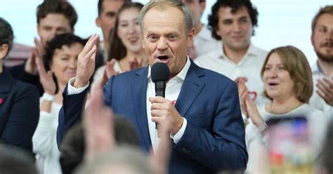 Poland’s opposition leader Tusk declares win after exit poll shows ruling populists losing majority
